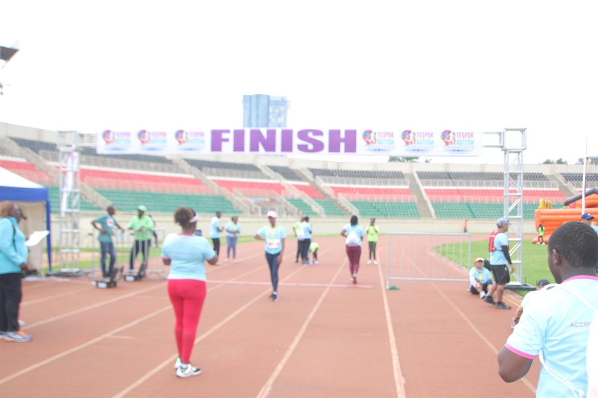 Runners at the TESPOK Autism Marathon finish line